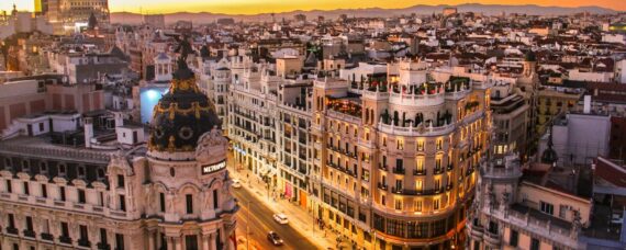aerial photogrMadrid, Españaaphy of vehicles passing between high rise buildings